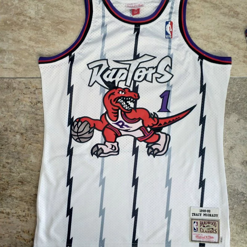 Regata NBA Mitchell & Ness Raptors 1998/99 Retro Macgrady #1 Regata NBA Mitchell & Ness Raptors 1998/99 Retro Macgrady #1