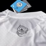 Camisa Manchester City Branca Dragão de Madeira 2024/25 Jogador