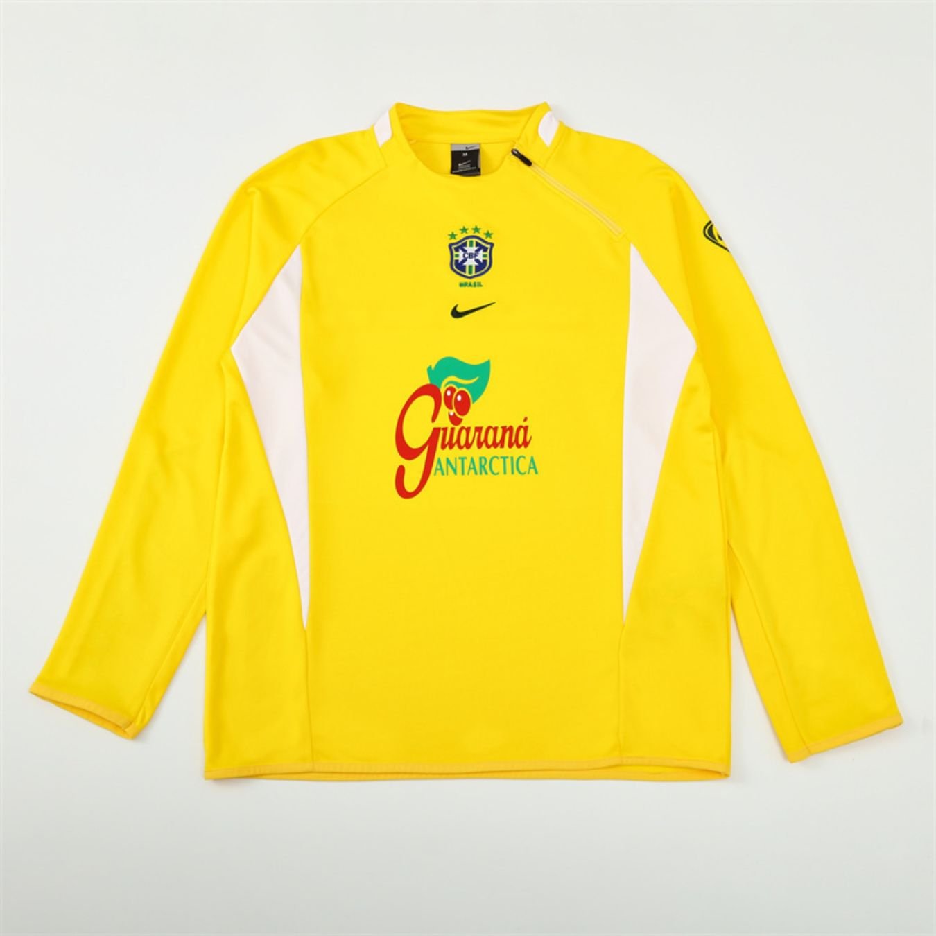 jaqueta-brasil-amarela-guarana-nike-2025-26-masculina Jaqueta Brasil Amarela Guaraná Nike 2025/26 Masculina